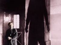 Poster for the movie "Shadows and Fog"